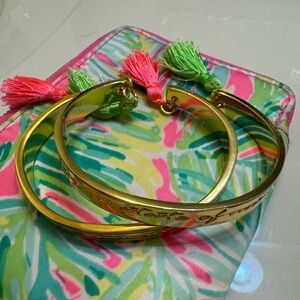 Lilly Pulitzer gold bracelets with tassels